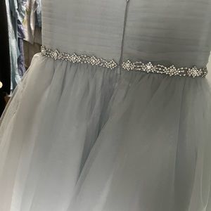 Gray/blue child’s tea length formal dress.